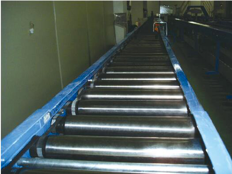 роликовой конвейер, приводимый на зубья