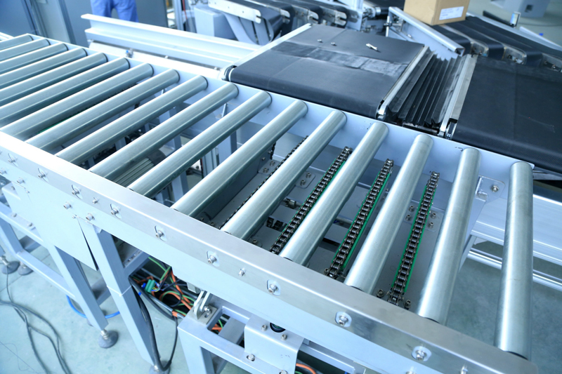 Подъемный конвейер